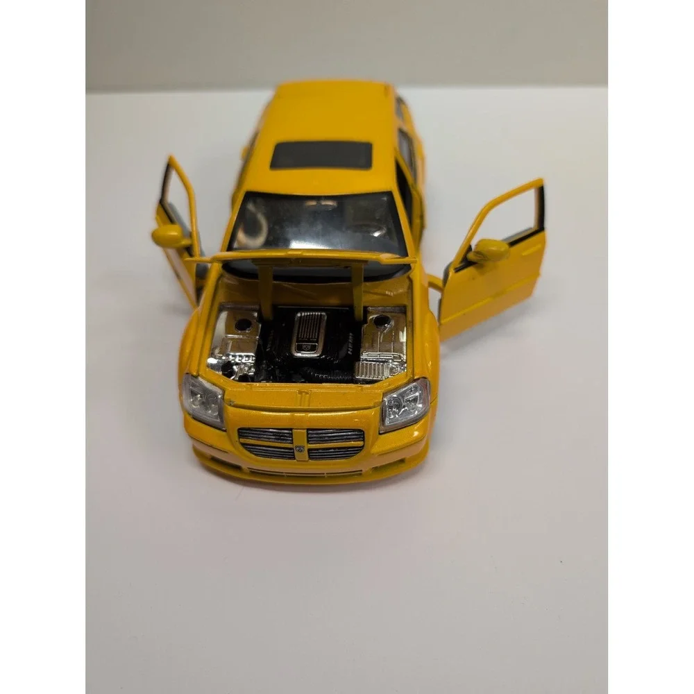 2006 Dodge Magnum R/T Yellow Black Stripes by Jada Big Time Muscle Diecast 1:24